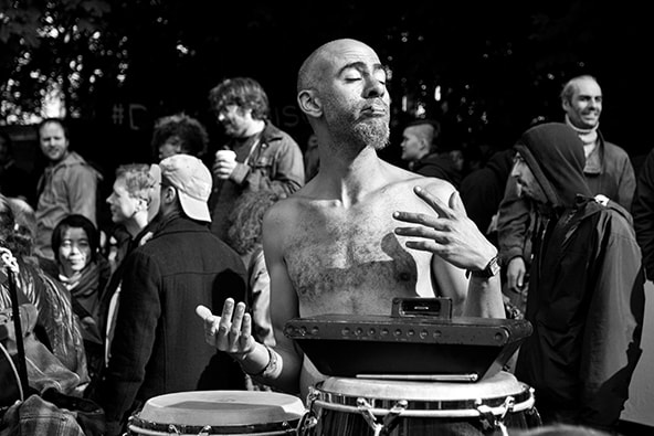 sun hits the face of a drummer at occupy montrea
